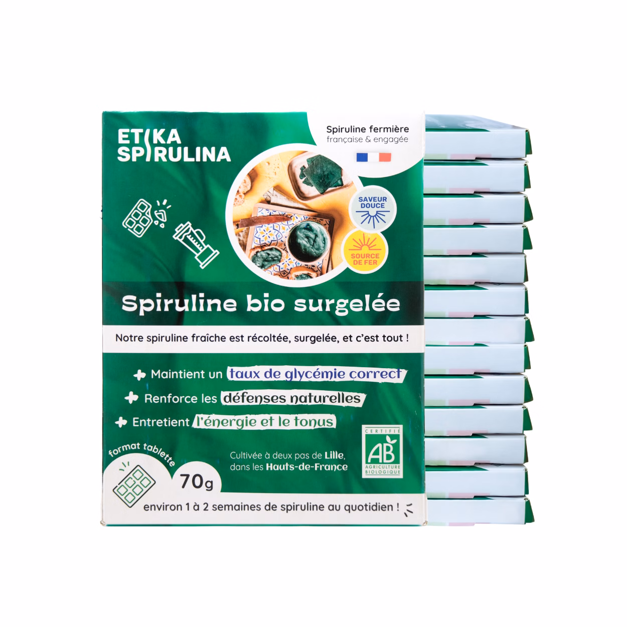 Photo de 14 sachets fermés de spiruline surgelée Etika Spirulina, conditionnés en emballages individuels
